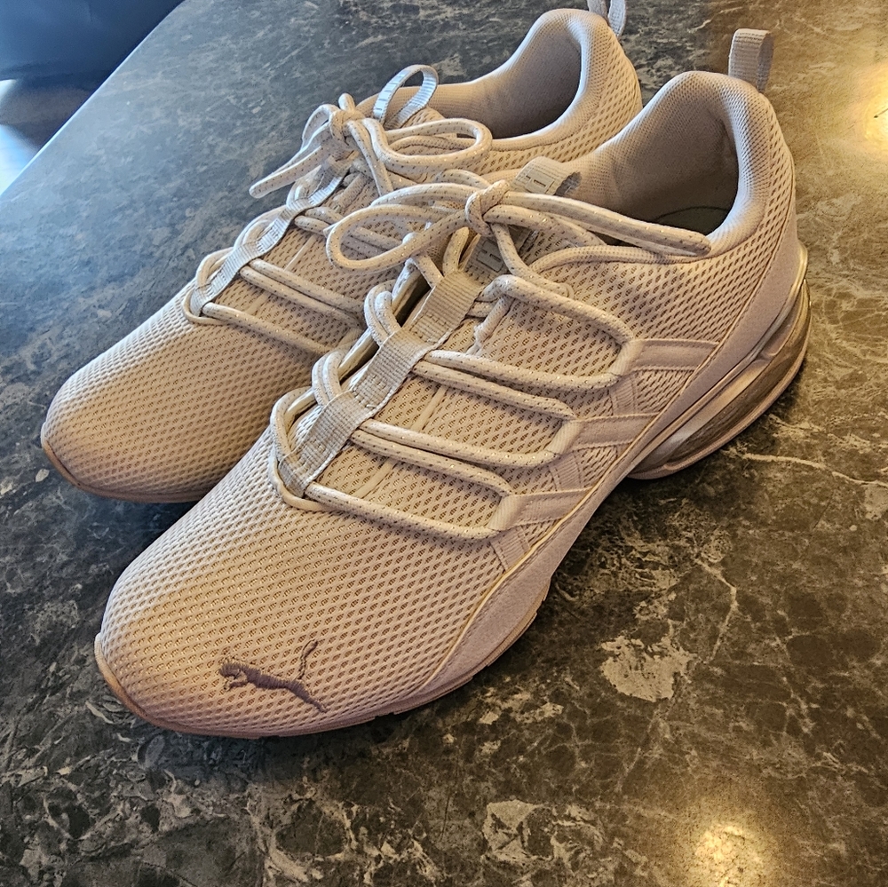 Womens size 10 Puma worn once around the house.